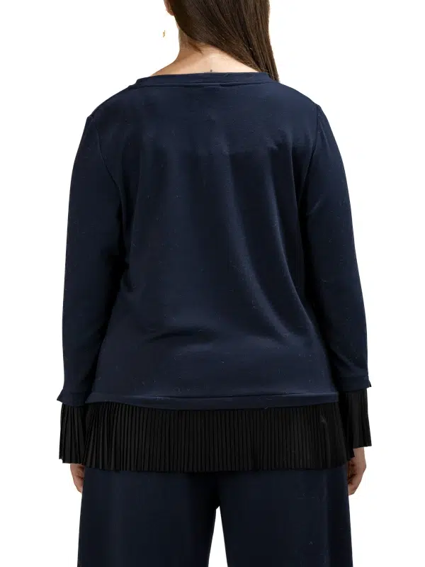 tricot à volant plissé